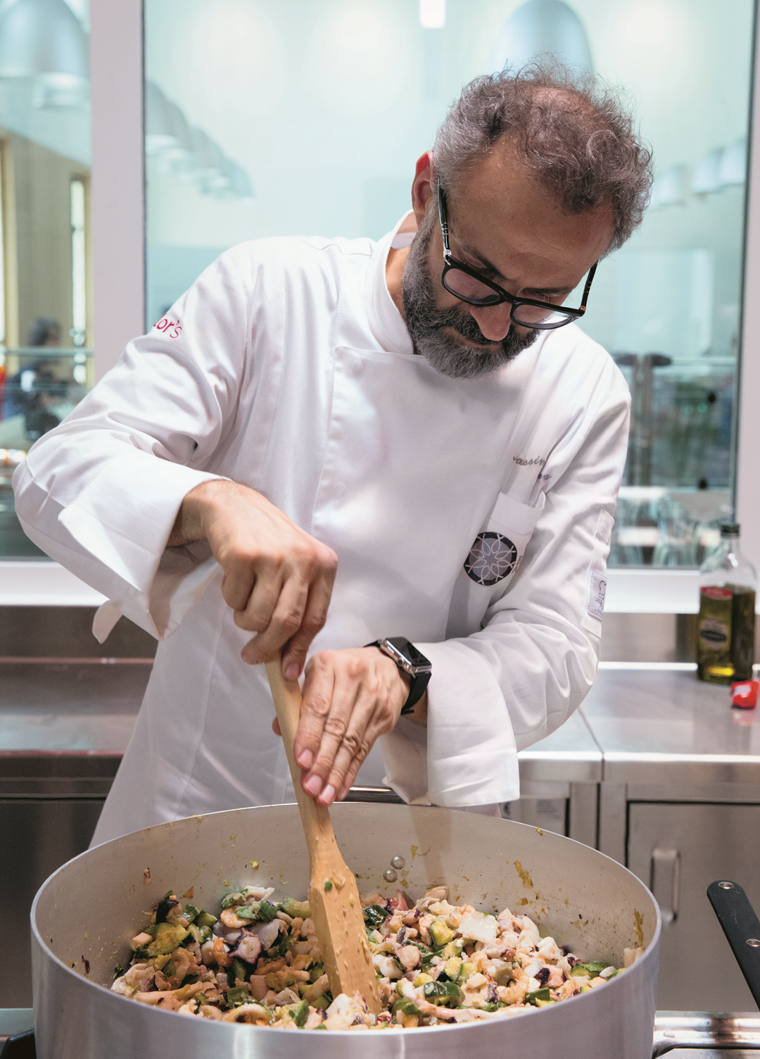 Massimo Bottura cooking at the original Refettorio in Milan