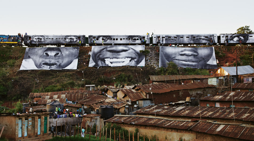 Women are Heroes: Train passing, Kibera, Kenya, 2009