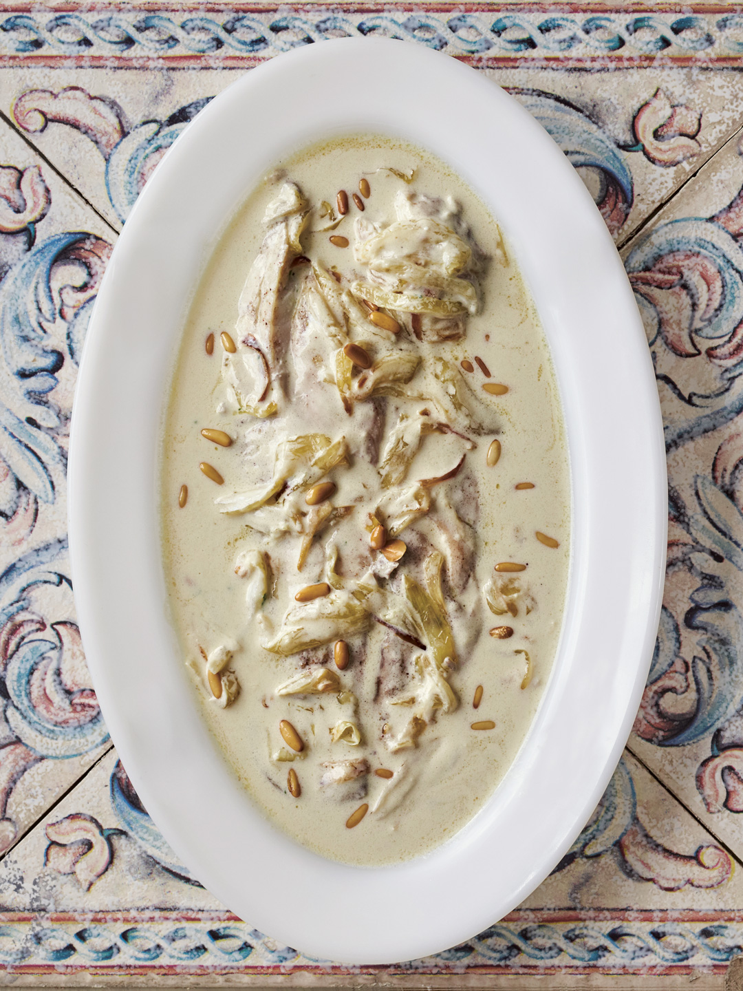 Fish Tahini and Onion Sauce and Pine Nuts.