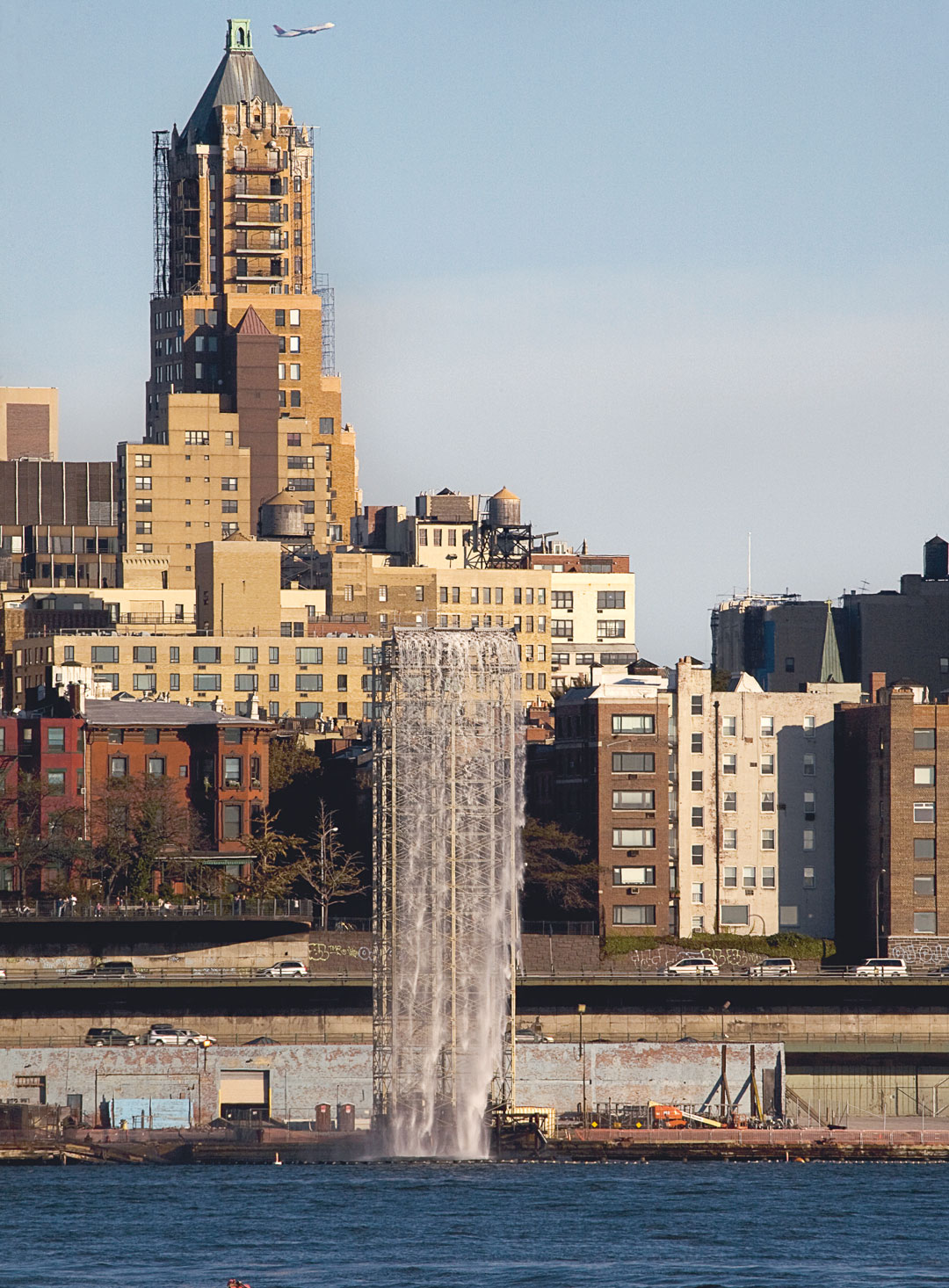 The New York City Waterfalls, 2008 (four waterfalls positioned along New York’s East River), water, scaffolding, steel grillage and troughs, pumps, piping, intake filter pool frames and filter fabric, LED lights, ultra-violet filters, concrete, switch gears, electrical equipment and wiring, control modules, anemometers, showing Brooklyn Piers, New York, 2008. Photo Christopher Burke