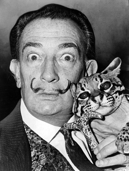 Salvador Dalí with his pet ocelot, Babou, 1965