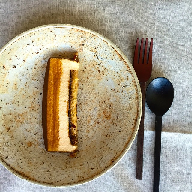 Large plate by Kouichi Uchida, with a slice of white chocolate and stone-ground Japanese date cake. Courtesy of René Redzepi's Instagram.