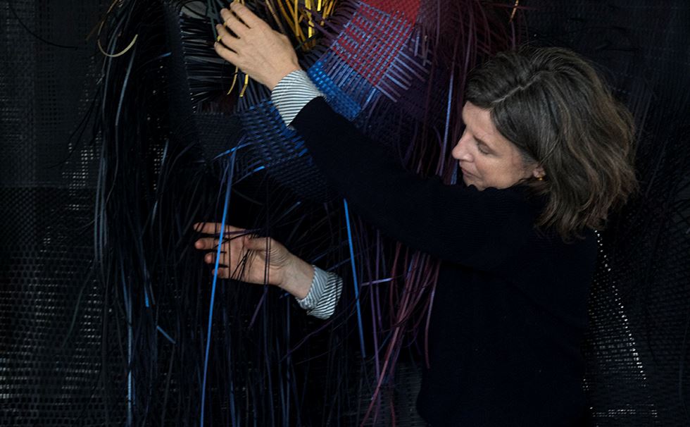 Hella Jongerius working on the hanging woven tapestries for Breathing Colour. Image courtesy of Jongeriuslab and the Design Museum