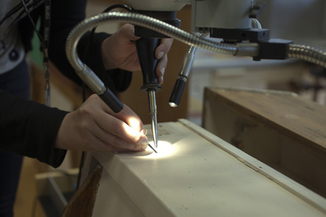 MoMA's restorers work on the Le Corbusier kitchen