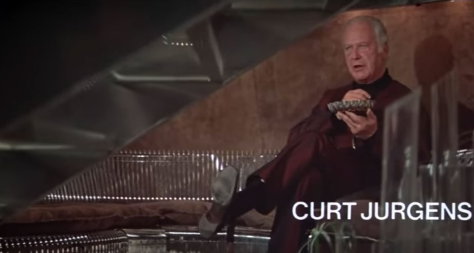 Bond villain Karl Stromberg (Curt Jurgens) reclines on a Pantonova sofa in the trailer for The Spy Who Loved Me